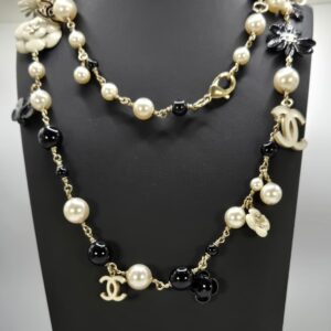 Chanel long pearl necklace with Camelia flowers black beads and CC charms B13C