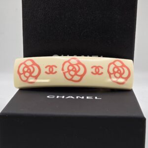 Chanel cream resin hair barrette with pink camelia flowers and CC logos 03P